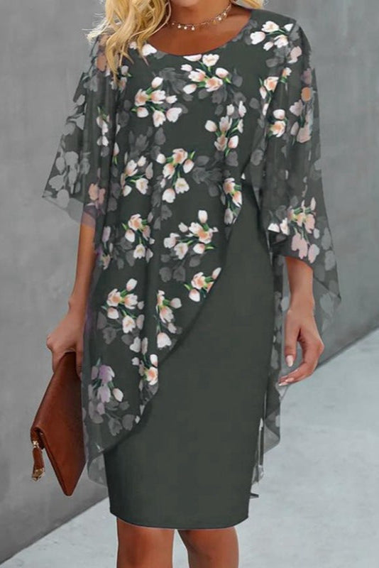 Modna damska sukienka w kolorowe kwiaty. Elegancki letni wzór, idealny na co dzień i specjalne okazje.