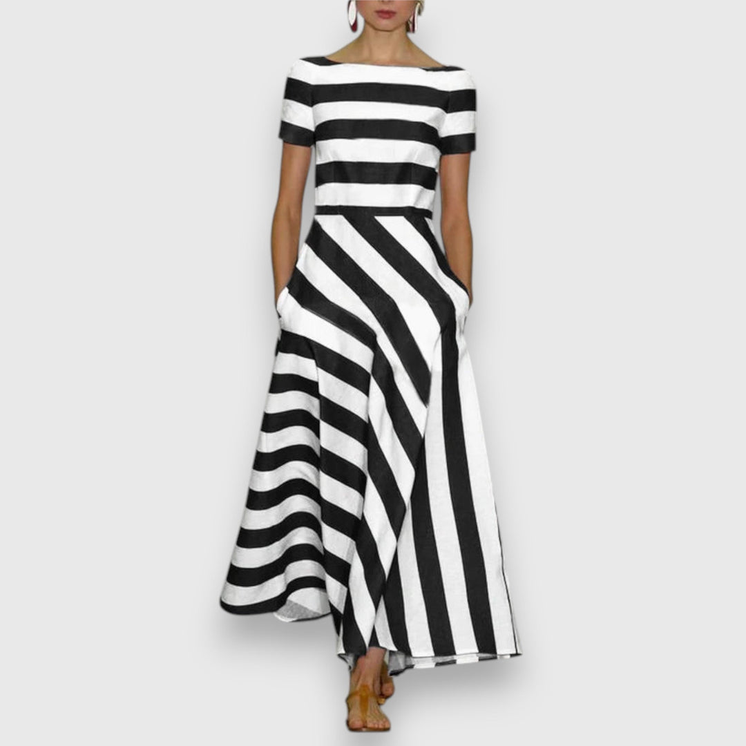Elegancka letnia sukienka maxi w paski, must-have w damskiej szafie. Idealna na codzień i specjalne okazje.