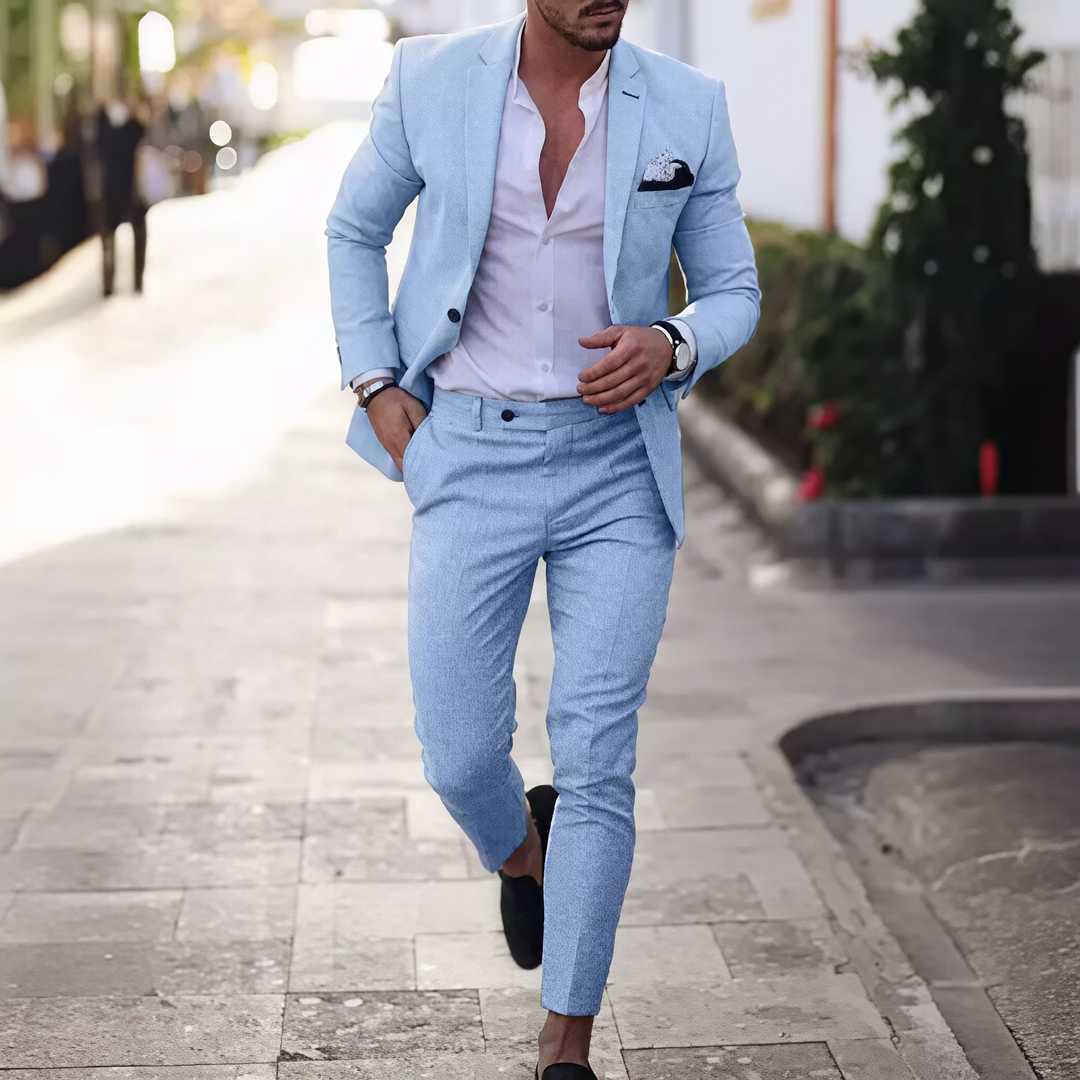 Męski elegancki zestaw slim fit: dopasowana marynarka i spodnie. Idealny do biura i na specjalne okazje.