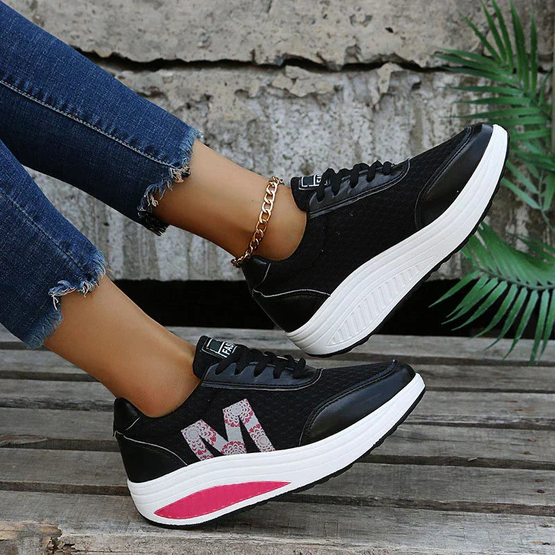 Z bliska: tekstura materiału i design damskich sneakersów ortopedycznych z komfortową amortyzacją.