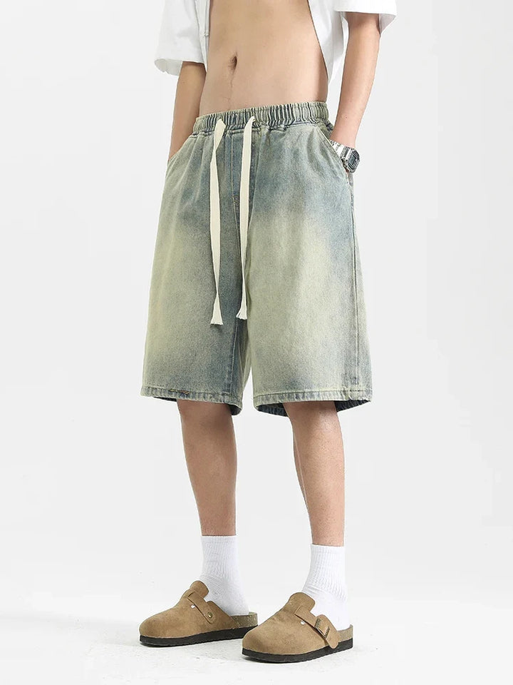 Męskie sprane długie szorty baggy fit. Idealne na lato, komfortowe i modne, styl streetwear.