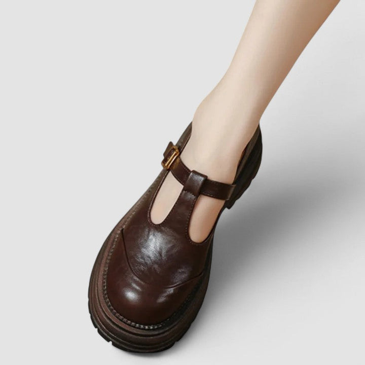 Damskie buty Mary Jane Bronte w stylu vintage, brązowe. Buty z paskiem T na platformie, zapewniające komfort i styl.