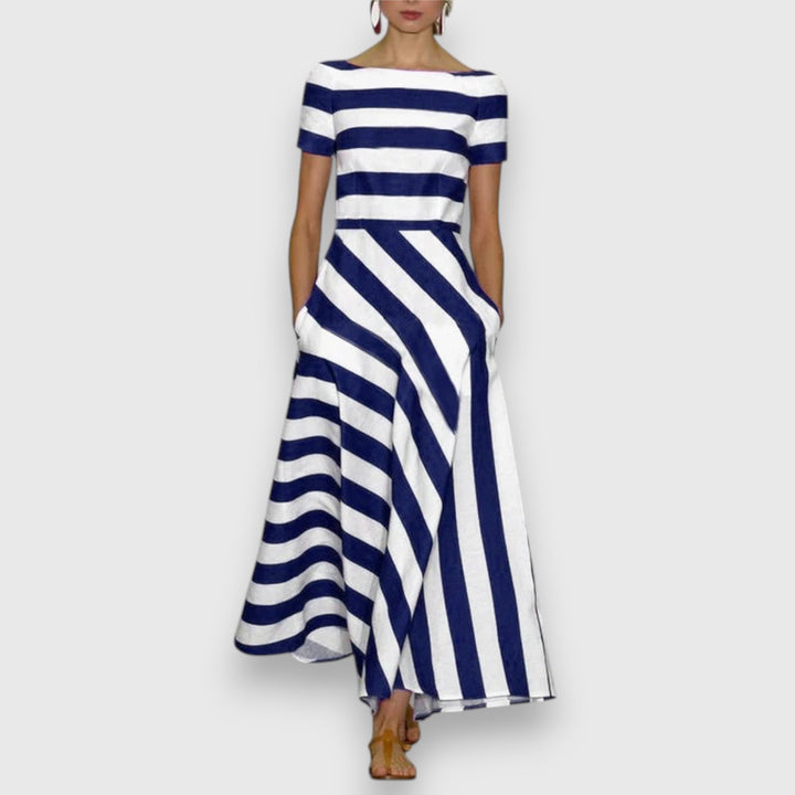 Damska letnia sukienka maxi w paski, elegancka i komfortowa. Idealna na upalne dni i wakacyjne stylizacje.