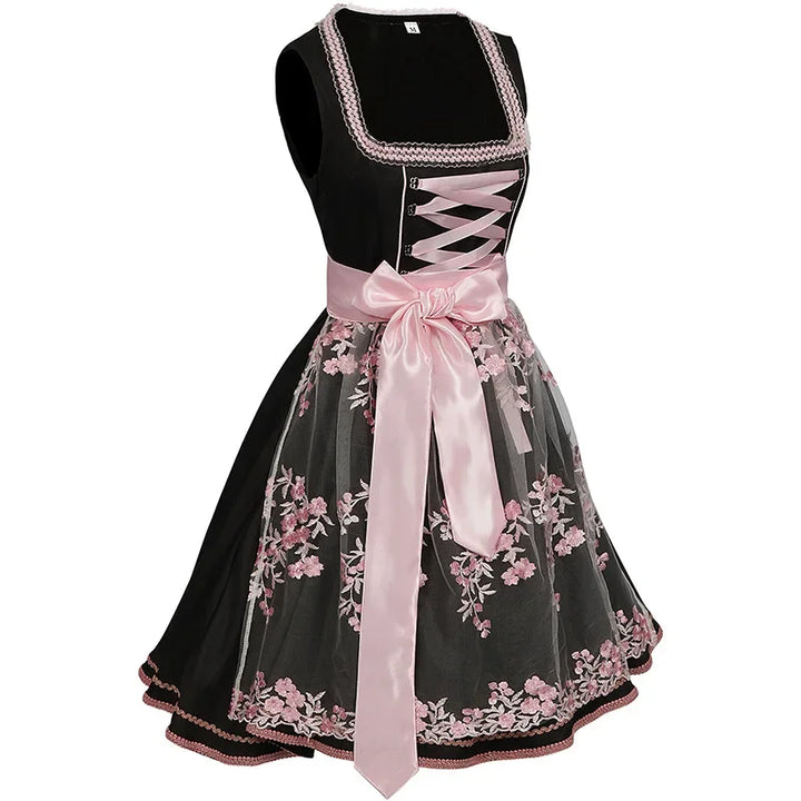 Tradycyjny czarny dirndl damski z motywem kwiatów, styl bawarski na festyn.