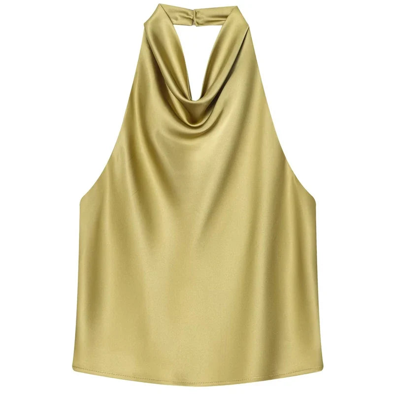 Uniwersalny damski top halter. Drapowany dekolt i fason bez rękawów pasują do wielu stylizacji.