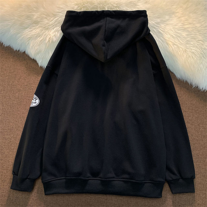 Bluza męska oversize z kapturem, stylowym nadrukiem. Idealna do noszenia na co dzień, zapewniając komfort.