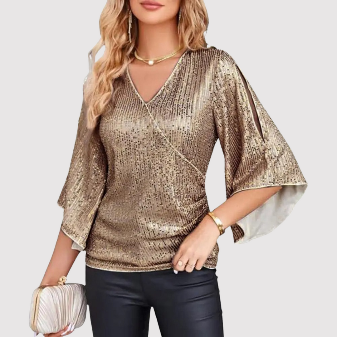 Modny top damski cekinowy, elegancka bluzka wieczorowa z błyszczącymi cekinami i dzwonkowymi rękawami. Styl glamour.