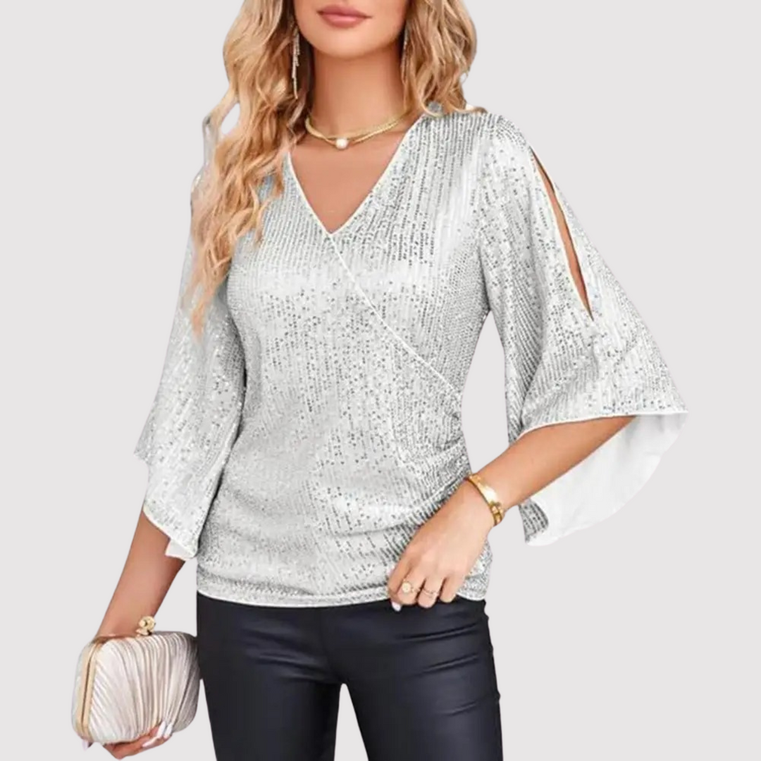 Damski top cekinowy z modnymi dzwonkowymi rękawami, idealny na wieczorowe wyjścia. Błyszcząca bluzka glamour.