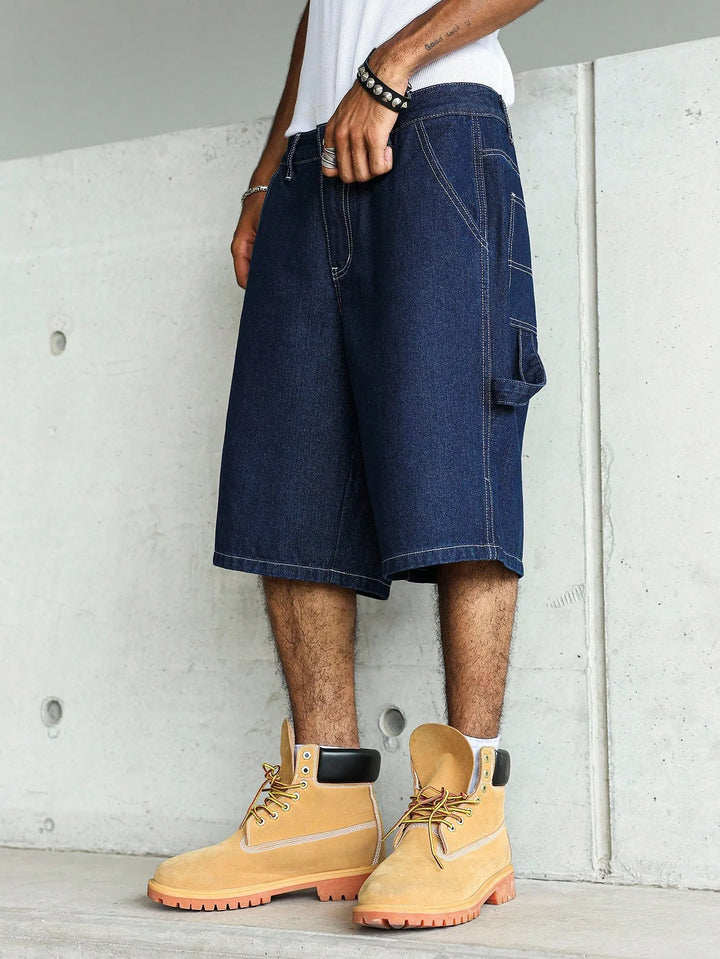 Wygodne granatowe szorty męskie baggy, z luźnym krojem. Długie, idealne do miejskich stylizacji streetwear na lato.