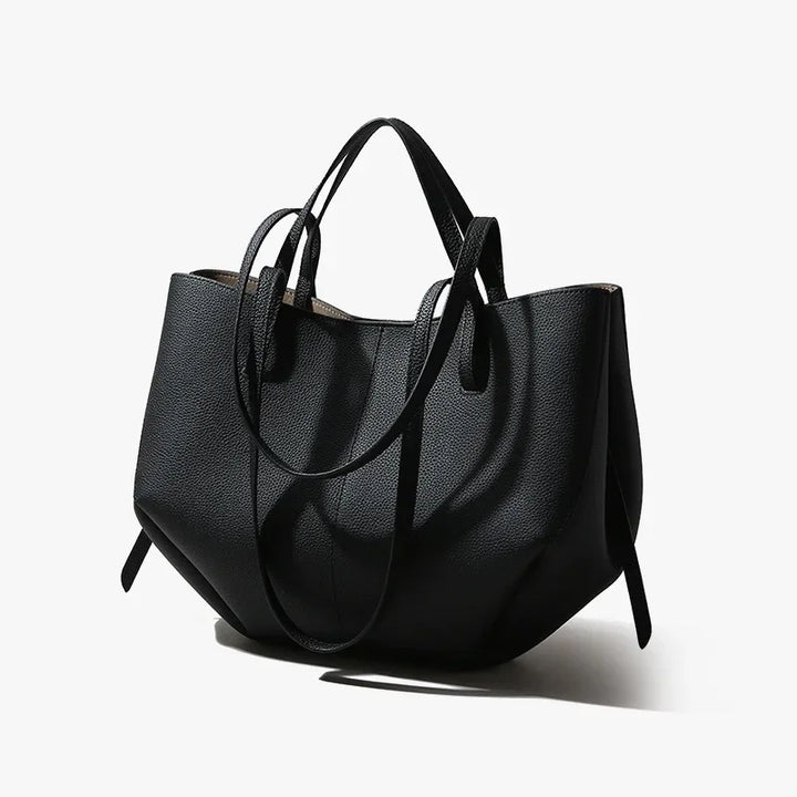 Elegancka czarna torebka damska shopper, modna i praktyczna na ramię, na zakupy.
