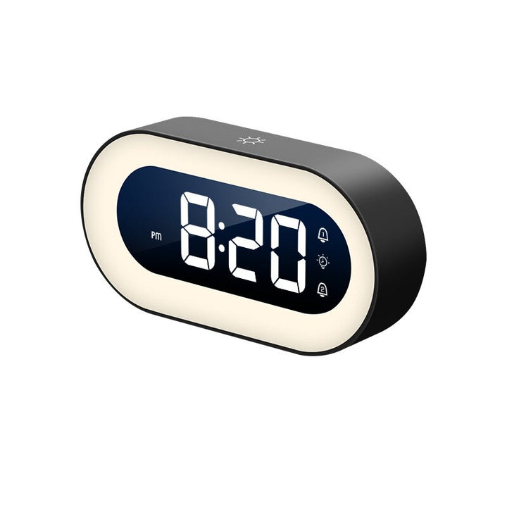 Kompaktowy, nowoczesny budzik cyfrowy LED z podświetleniem nocnym. Akumulatorowy zegar mobilny do sypialni i biura.