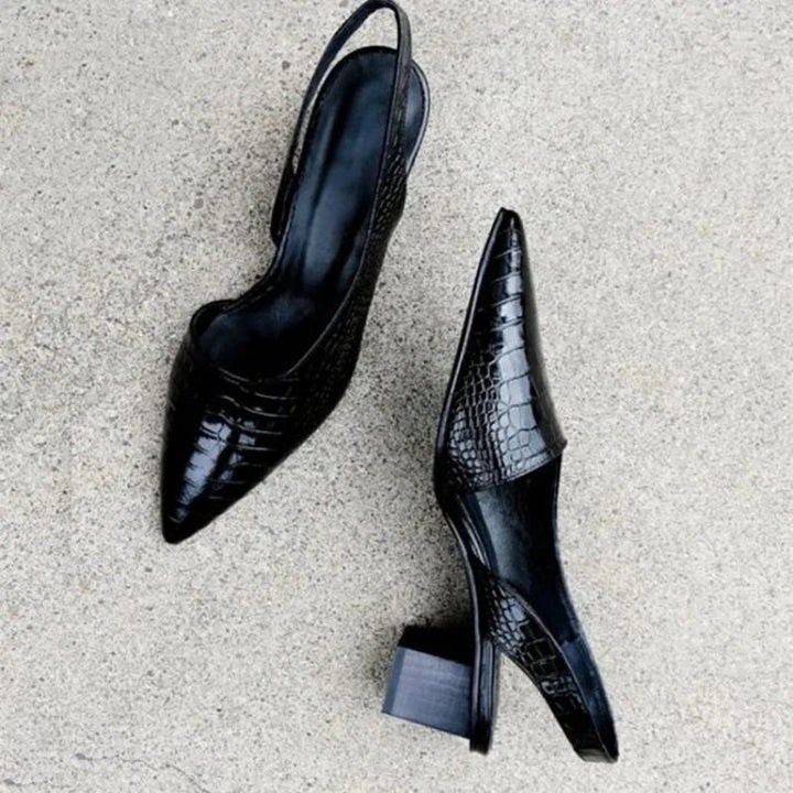 Letnie sandały damskie slingback na słupku, z eleganckim szpiczastym noskiem. Idealne obuwie na upalne dni.