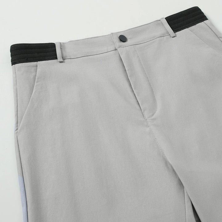 Modne męskie szorty casualowe slim fit w letnim kolorze. Idealne, dopasowane spodenki na upalne lato.