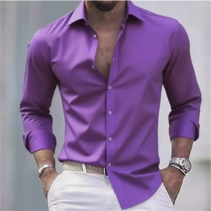 Klasyczna bawełniana koszula męska z długim rękawem. Dopasowany krój, jednolity kolor. Na smart casual i biuro.