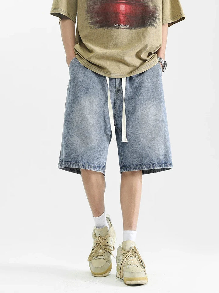 Praktyczne męskie sprane szorty baggy fit, długie. Modne na lato, idealne na co dzień.