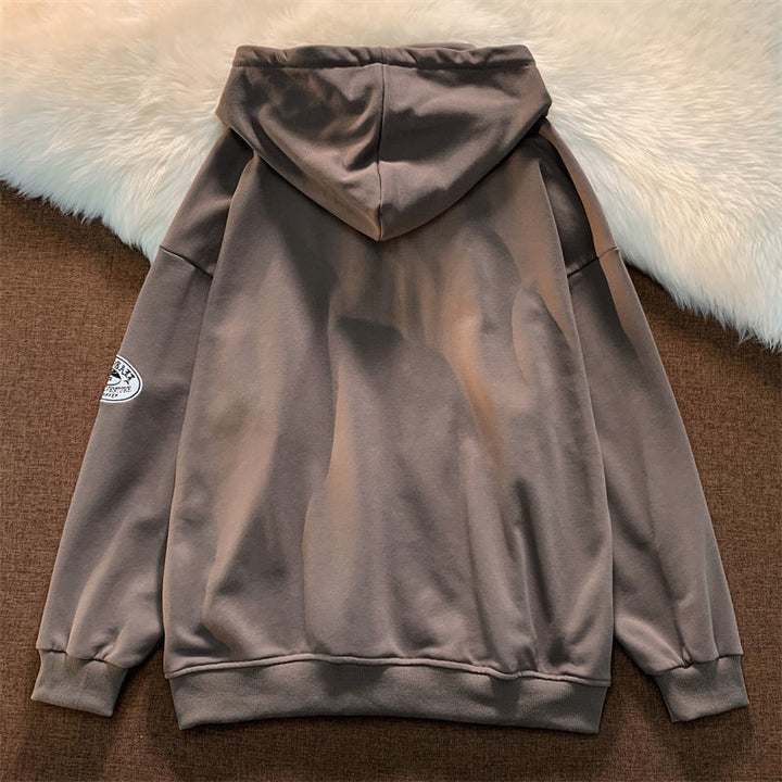 Casualowa bluza męska oversize z kapturem i modnym nadrukiem. Idealna na co dzień i do stylizacji streetwear.