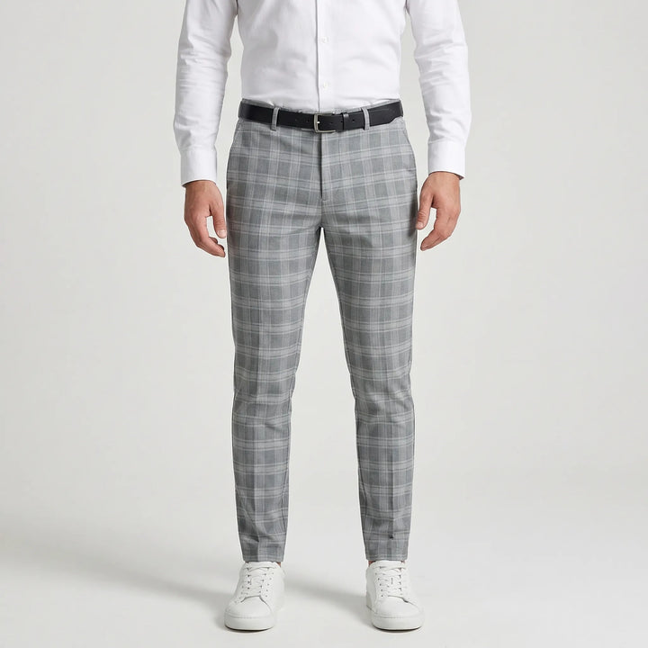 Eleganckie męskie spodnie w kratę slim fit do kostki. Idealne do casualowych i smart-casualowych stylizacji.