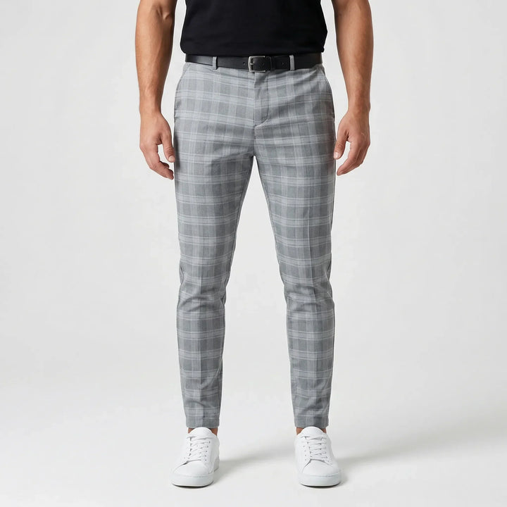 Stylowe męskie spodnie slim fit Cornelius w kratę. Modne, dopasowane i wygodne, idealne na każdą okazję.