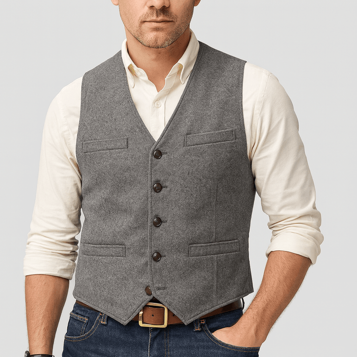 Stylowa kamizelka tweedowa męska, krój slim fit. Podkreśla modę męską, elegancki wygląd.