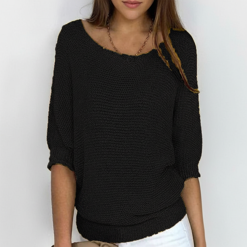 Damski sweter nietoperz z komfortowego materiału. Luźny krój, modny dodatek do stylizacji.