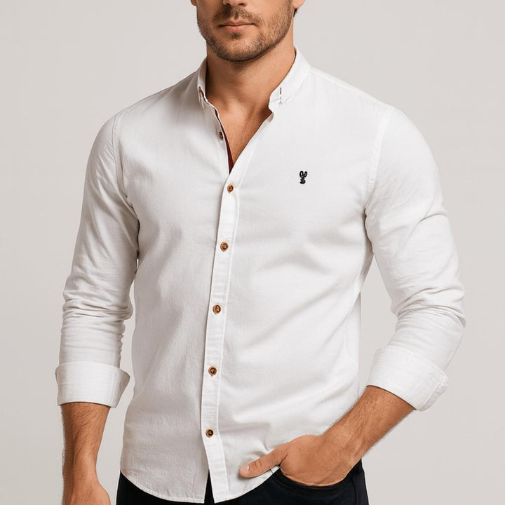 Elegancka męska koszula z długim rękawem, slim fit. Klasyczny design do modnych stylizacji męskich.