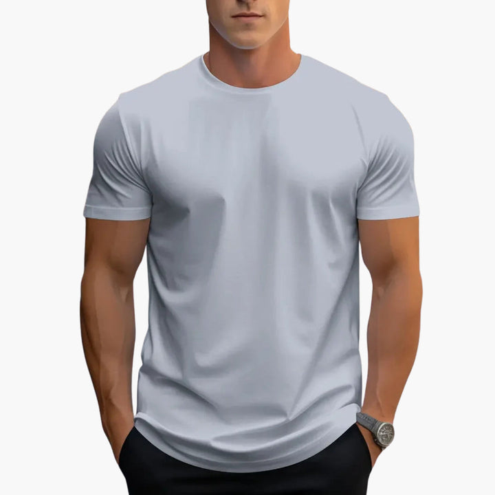 Wszechstronny męski T-shirt slim fit. Krótki rękaw, okrągły dekolt. Idealny na co dzień i do mody casual.