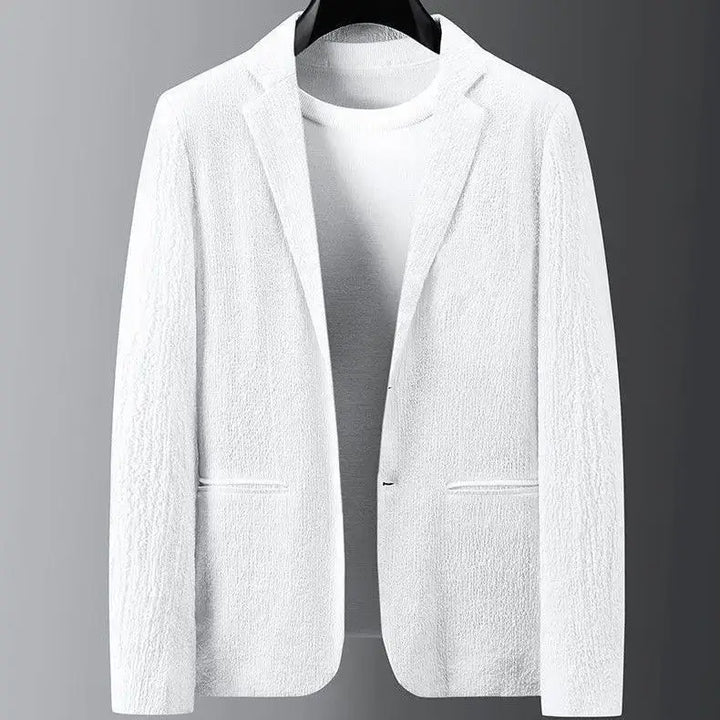 Stylowy męski komplet Harvey z teksturowanym żakietem i spodniami. Idealny do eleganckich stylizacji.