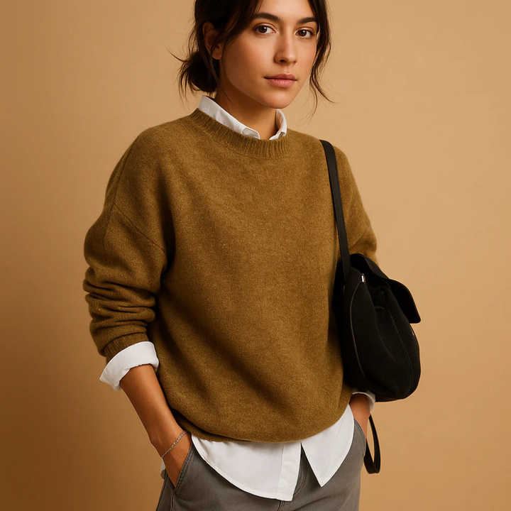 Uniwersalny damski sweter z długim rękawem z wełny. Miękki, ciepły i elegancki na każdą okazję.