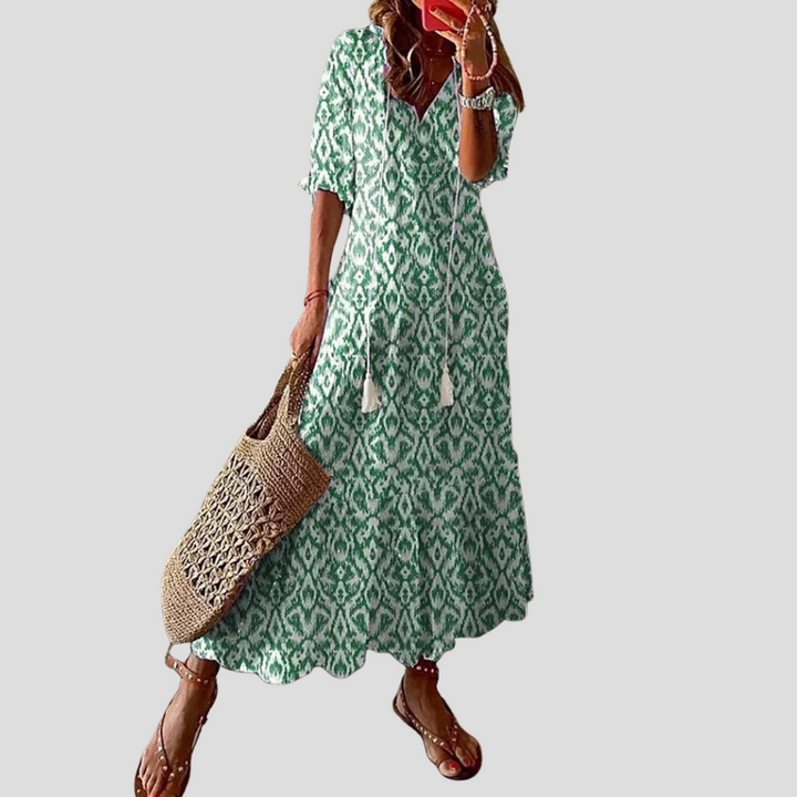 Damska sukienka maxi boho na lato, plażę i wakacje. Casualowa, ale elegancka, podkreślająca swobodny styl.