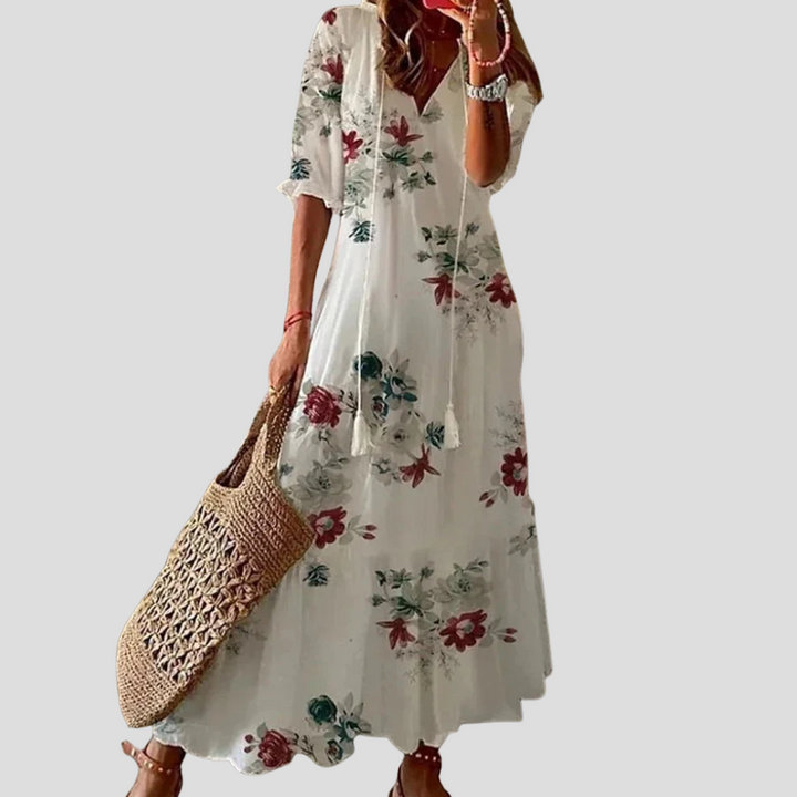 Komfortowa długa sukienka maxi boho, damska, na lato i wakacje. Zwiewny krój zapewnia swobodę ruchów.