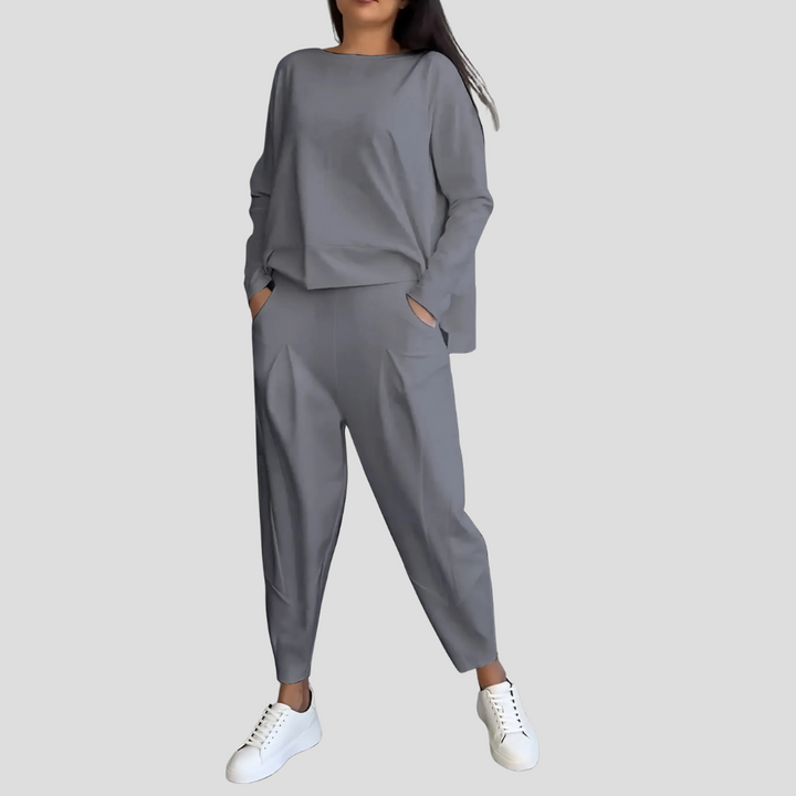 Wszechstronny komplet damski: bluza i spodnie, styl casualowy. Komfortowy strój na co dzień, moda kobieca.
