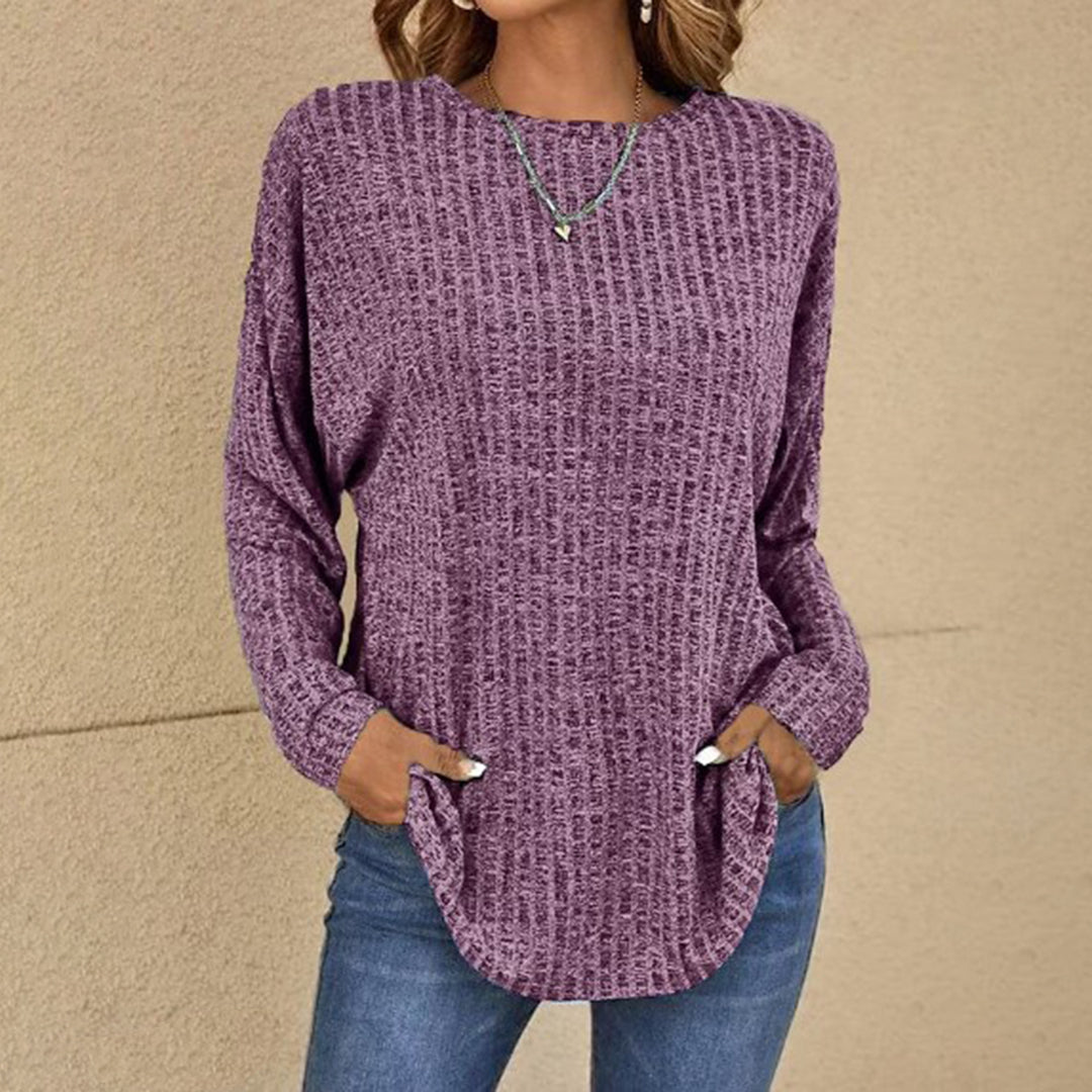Stylowy, długi sweter damski oversize. Luźny, wygodny fason, idealny na chłodne dni jesieni i zimy.