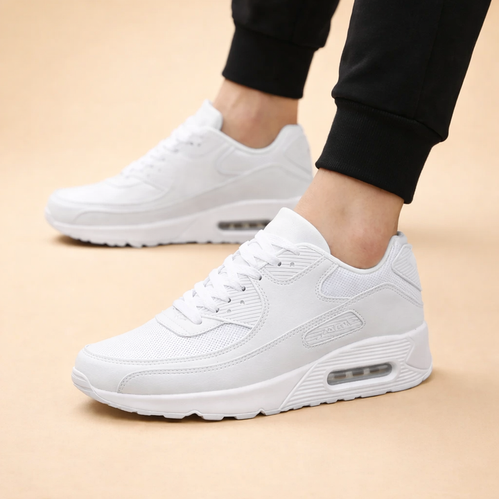 Komfortowe męskie sneakersy miejskie w biało-czarnej kolorystyce, idealne do codziennych, stylowych stylizacji.