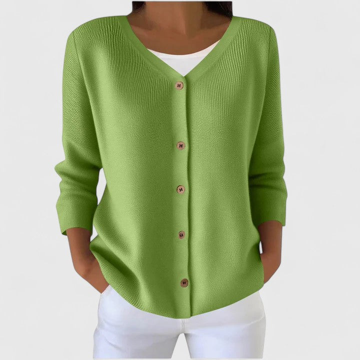 Elegancki damski sweter rozpinany z dekoltem V i stylowymi guzikami, idealny do stylizacji casual i formalnych.