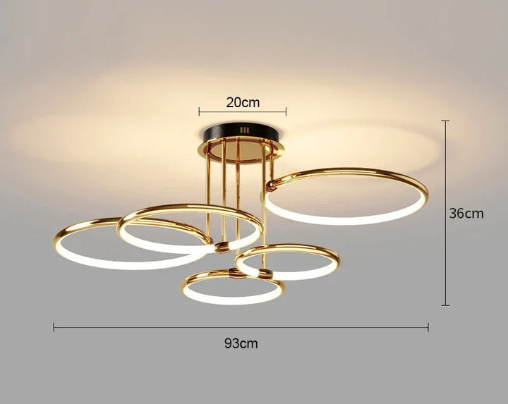 Elegancki złoty żyrandol LED do salonu, z geometrycznym designem. Nowoczesne i energooszczędne oświetlenie.