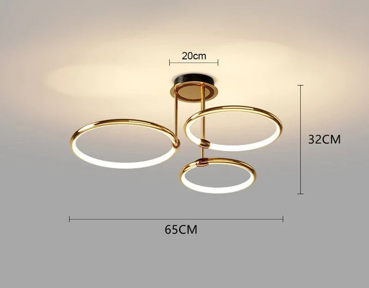Nowoczesny żyrandol LED, geometryczne złote kształty. Designerskie oświetlenie sufitowe do salonu.