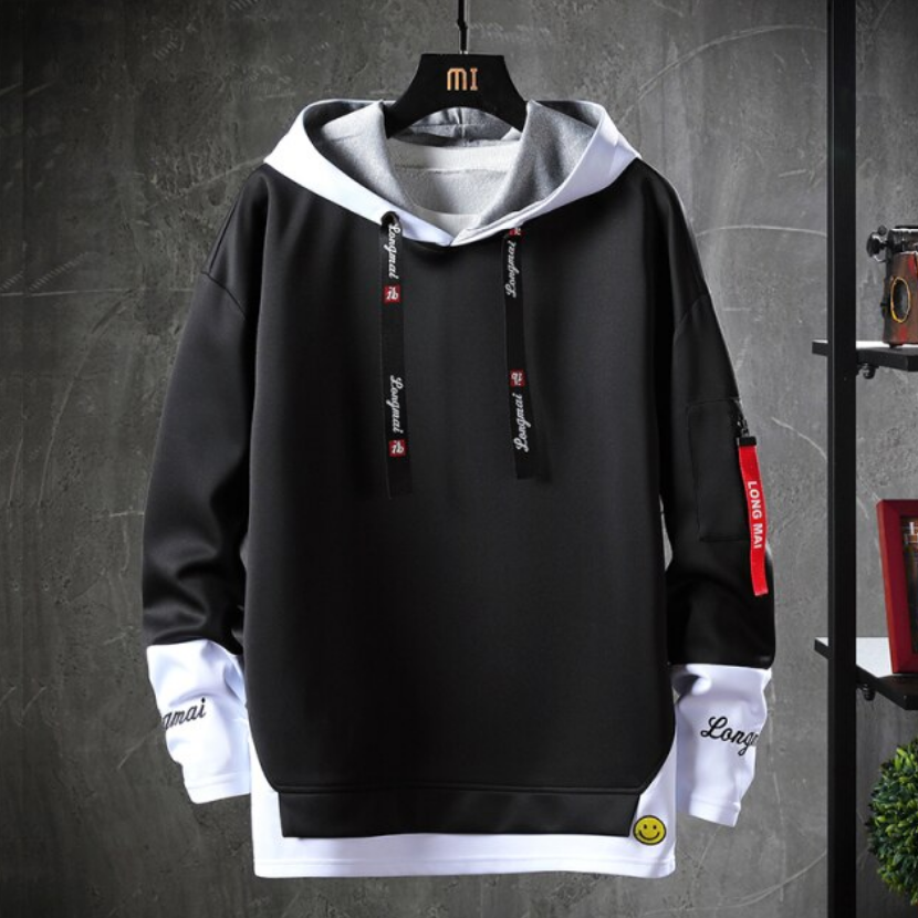 Komfortowa męska bluza nierozpinana z kapturem. Nowoczesny design, suwak na rękawie. Do sportowych i codziennych stylizacji.