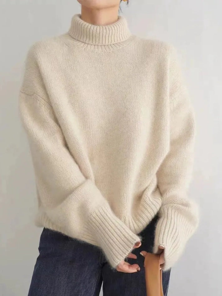 Damski elegancki sweter z golfem, idealny na jesień i zimę. Ciepły i modny, klasyczny styl.