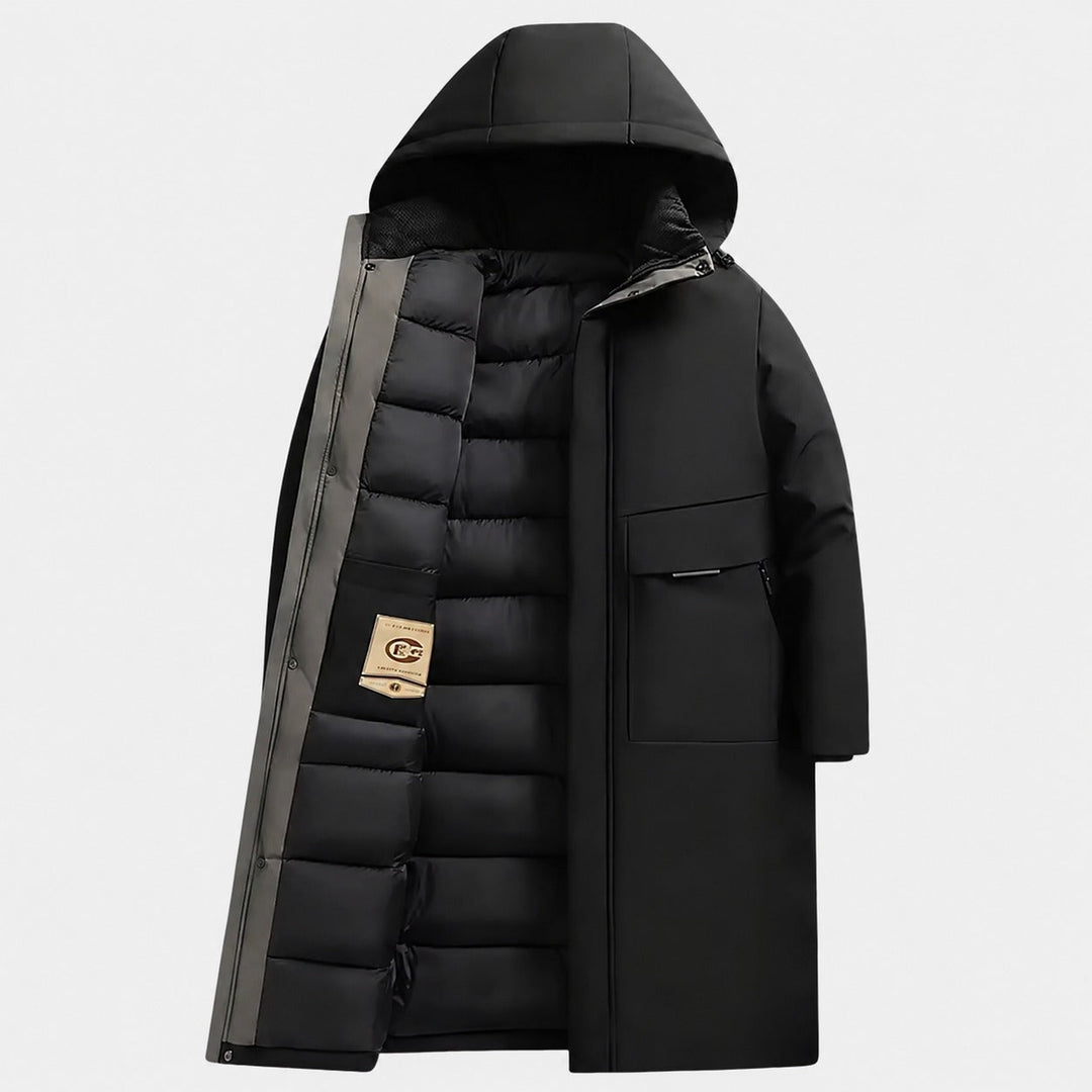 Stylowy męski długi płaszcz zimowy z kapturem, niezbędny element męskiej mody na sezon zimowy. Ciepły i elegancki.
