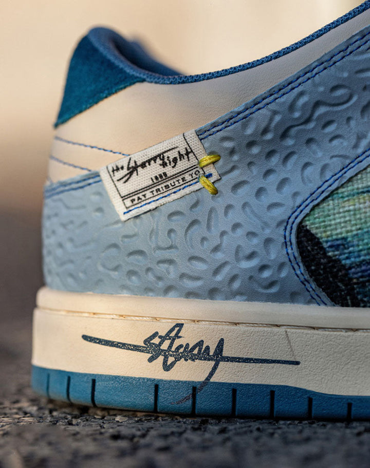 Tekstura materiału artystycznych sneakersów Lior unisex, z bliska pokazująca detale wzoru gwiazd.