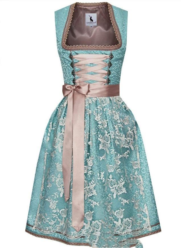 Modelka prezentuje damską sukienkę dirndl, bawarski strój ludowy na Oktoberfest, ze sznurowanym gorsetem.