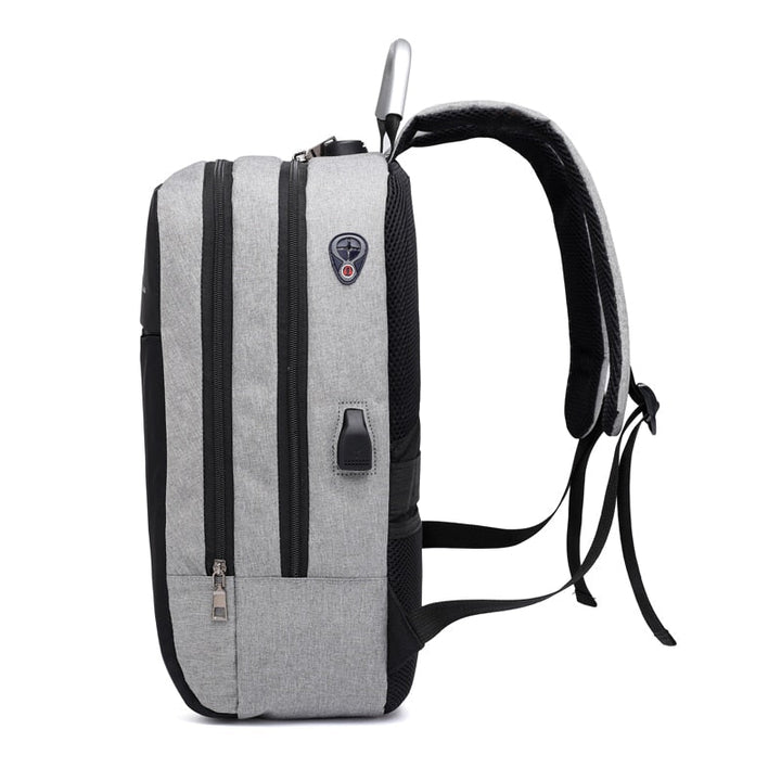 Czarny plecak antykradzieżowy unisex, z portem USB, odporny na wodę. Bezpieczny na laptop i tablet.