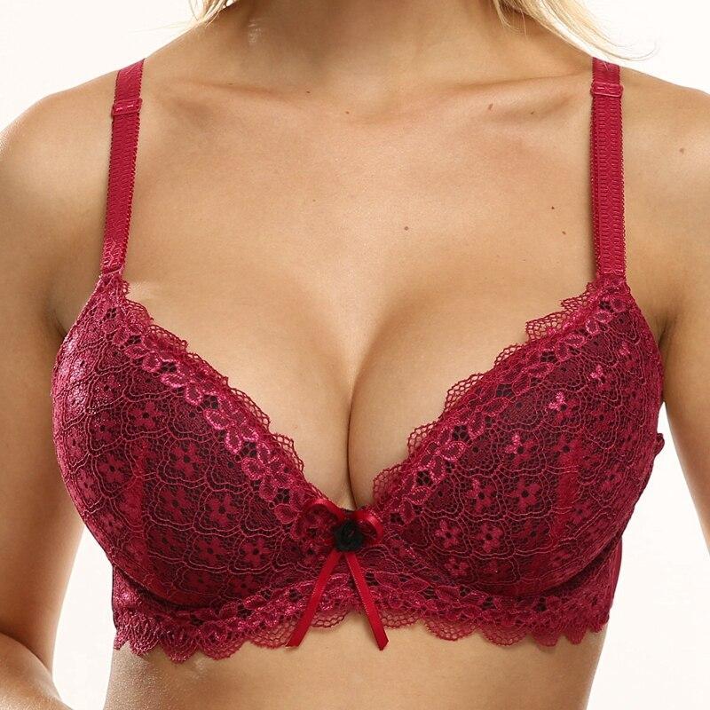 Modny damski biustonosz push-up z delikatnej koronki, ozdobiony kokardką. Podkreśla biust, zapewniając komfort. Elegancka bielizna.