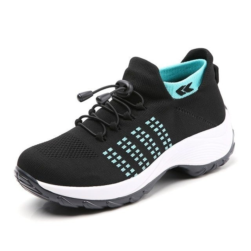 Stylowe sneakersy damskie Theresa na wysokiej platformie, modne i lekkie buty do miejskich outfitów.