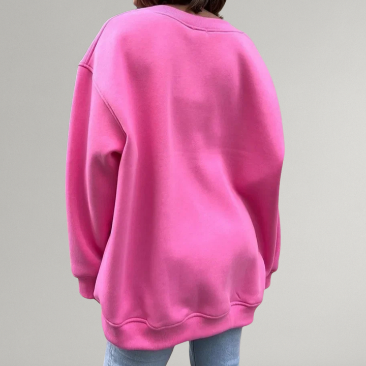Modna bluza damska oversize bez kaptura, idealna do stylizacji ulicznych. Okrągły dekolt, odzież damska.