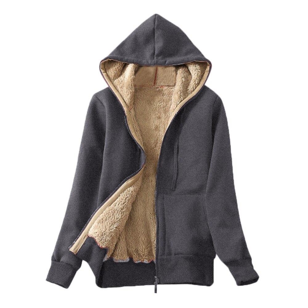 Damska bluza polarowa z kapturem w stylizacji casual. Rozpinana, miękka, idealna do noszenia na co dzień.