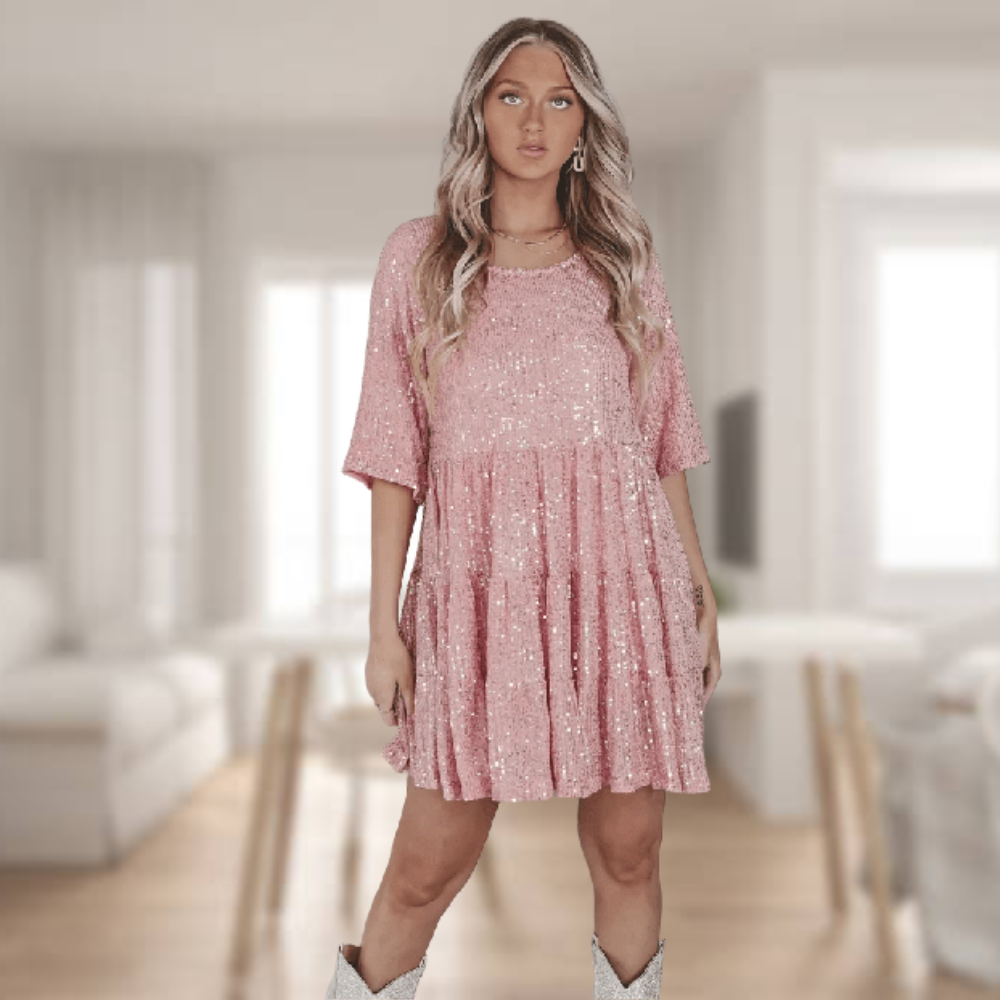 Damska sukienka Luna z cekinami w ruchu, idealna na parkiet. Błyszcząca kreacja w stylu glamour na imprezę.