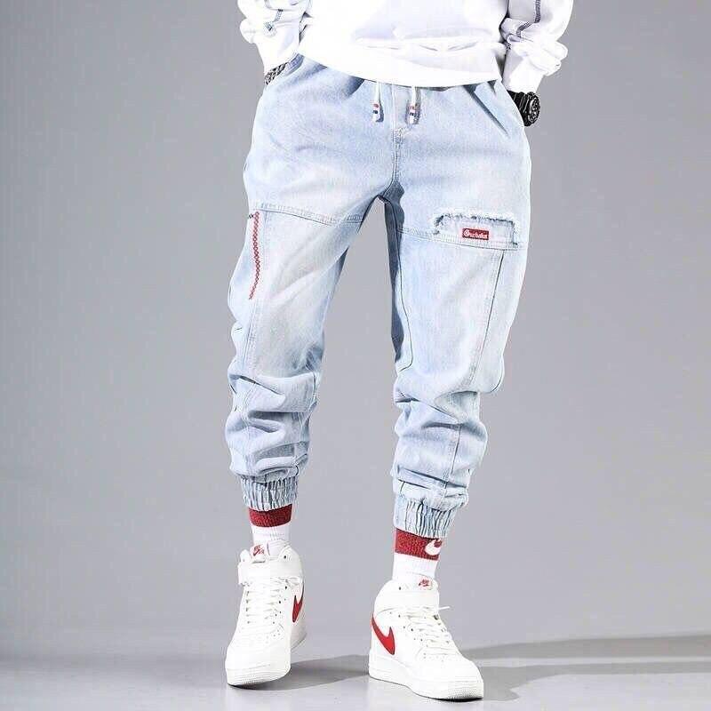 Męskie spodnie bojówki z gumką w pasie, luźny krój, streetwear i casual, wygodne i stylowe.