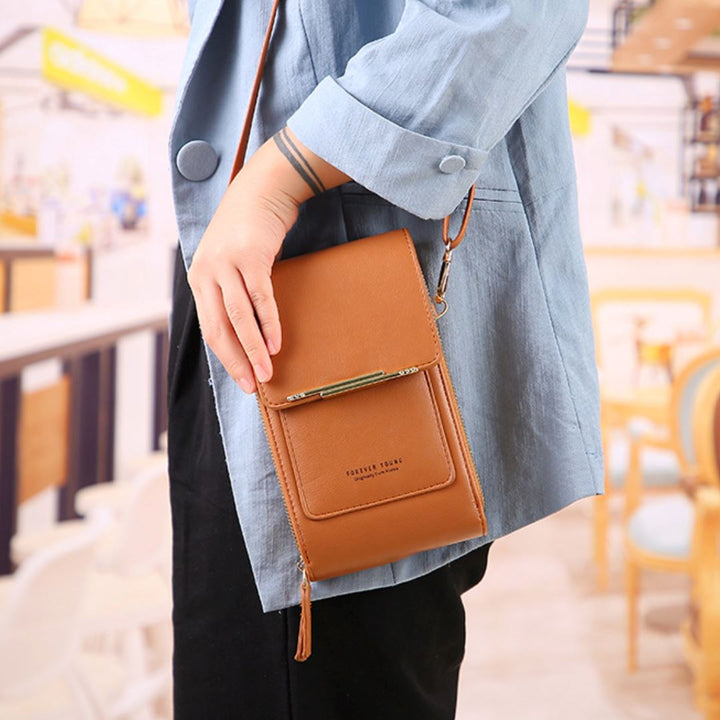 Czarna torebka crossbody damska, z praktycznym regulowanym paskiem. Wygodna i funkcjonalna.