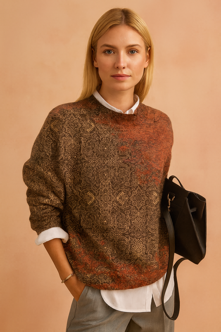 Modny sweter damski z unikalnym artystycznym nadrukiem. Wygodny, kolorowy i stylowy na każdą okazję.